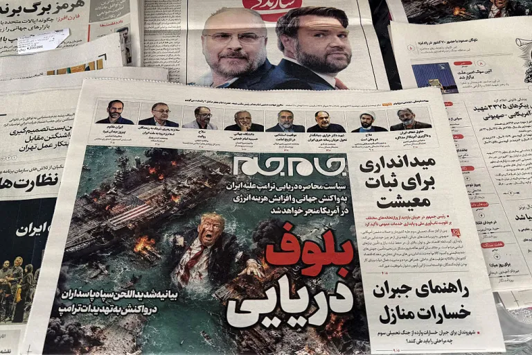 The front page of the Jam Jam newspaper on sale at a newsstand features a cartoon of US President Donald Trump drowning in the Strait of Hormuz with the headline 