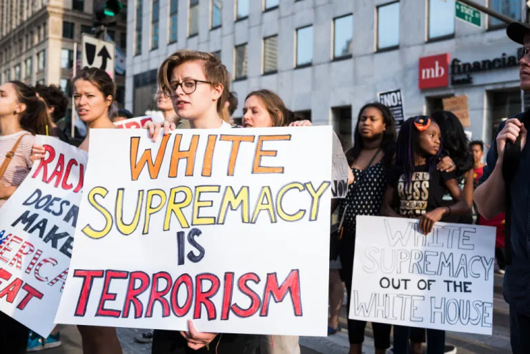 Demonstrators march towards Trump International Hotel and Tower Chicago in solidarity with the victims of the recent racist violence in Charlottesville, Va., in Chicago on August 15, 2017. People across the country continue to mourn the loss of demonstrator Heather Heyer and those injured when a car ran into a protest against white nationalists in Charlottesville, Va and are critical of President Donald Trump's vague response to the incident. (Photo by Max Herman/NurPhoto via Getty Images)