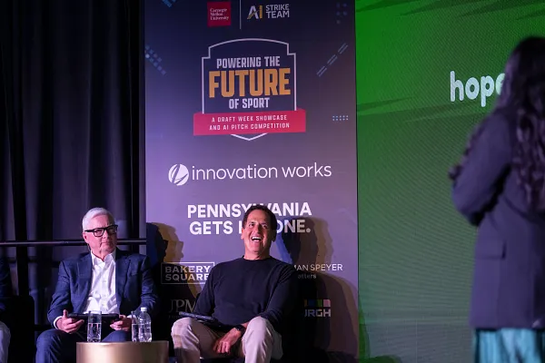 Ed Stack and Mark Cuban listen to pitches.