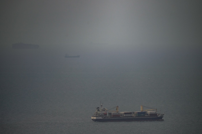 A cargo ship sails in the Persian Gulf toward the Strait of Hormuz, Wednesday, April 22, 2026. (AP Photo)