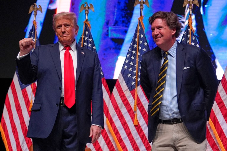 Republican presidential nominee former President Donald Trump speaks with Tucker Carlson.
