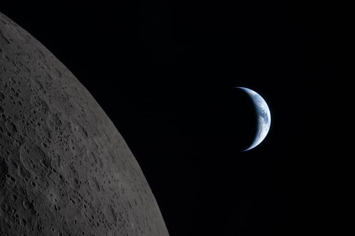 Earth next to the moon before Earthset.