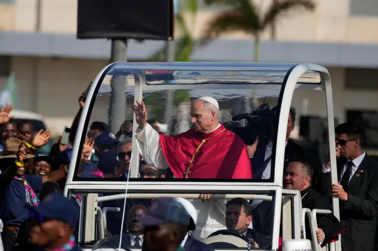 Pope Leo XIV waves after arriving in Luanda, Angola, Saturday, April 18, 2026 on the sixth day of his 11-day pastoral visit to Africa.